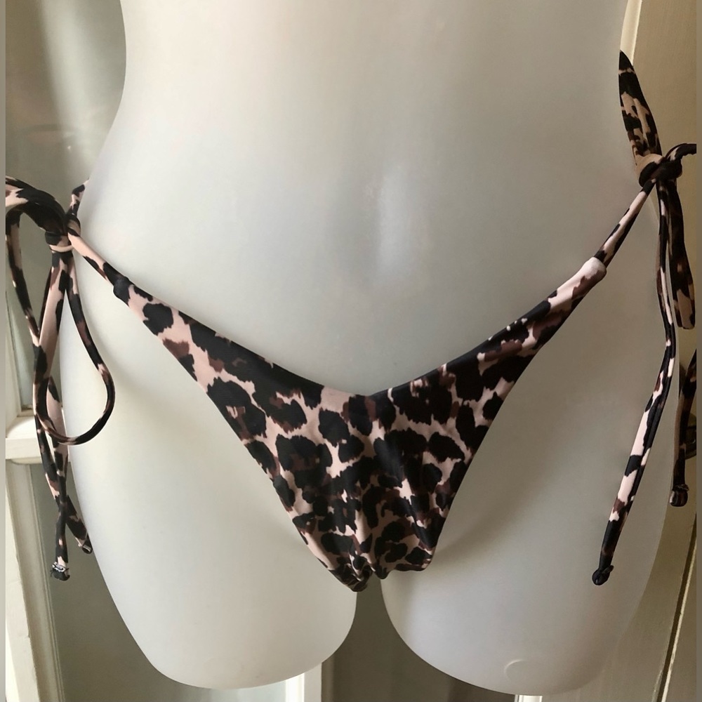 Women’s animal print bikini thong swim bottom in size small